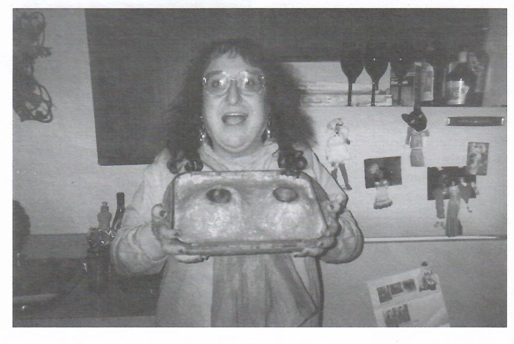 August 1998: A photo of Rachel Crandall holding a pan of mashed potatoes shaped like breasts.